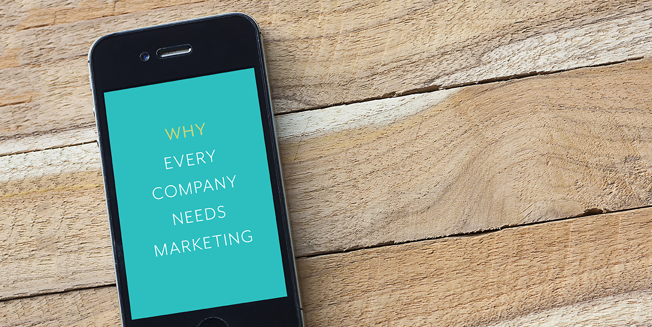 An iPhone reads, "Why every company needs marketing"