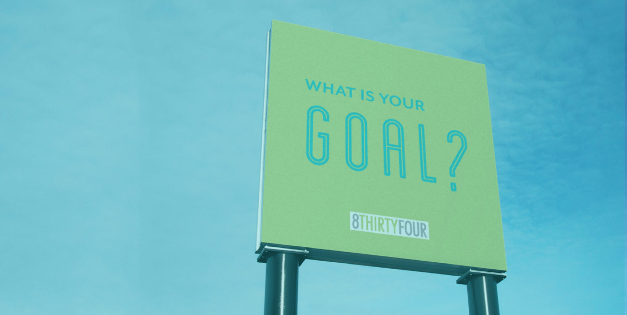 A billboard reads, "What is your goal? 8THIRTYFOUR"