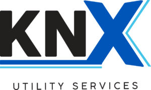 Black and blue letters read, "KNX Utility Services."