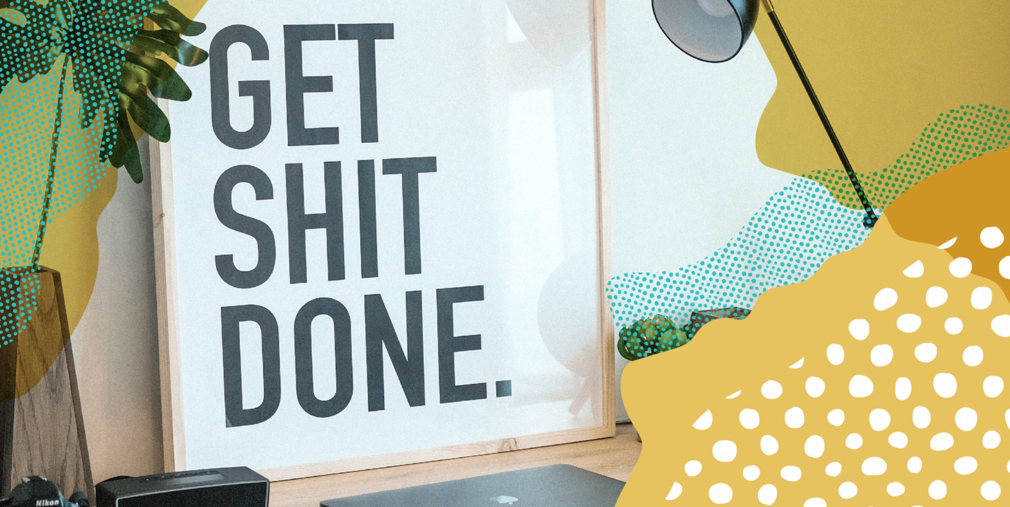 Framed photo on a desk that says, "Get shit done."