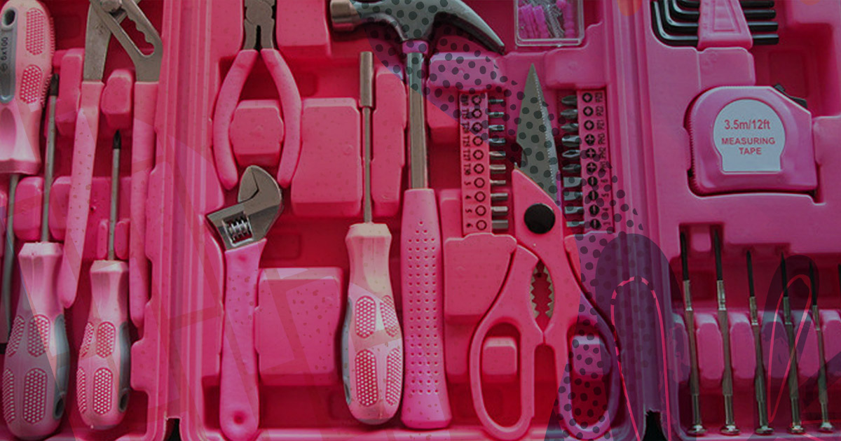 pink power tools including hammer, screwdriver, pliers and scissors