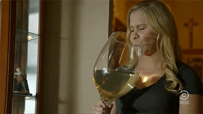 Amy Schumer drinks large glass of white wine