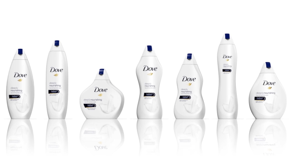 A line of Dove body care bottles varying in shapes and sizes