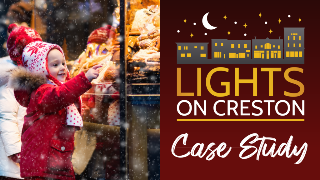 A toddler is window shopping and pointing to some baked goods "Lights on Creston Case Study"