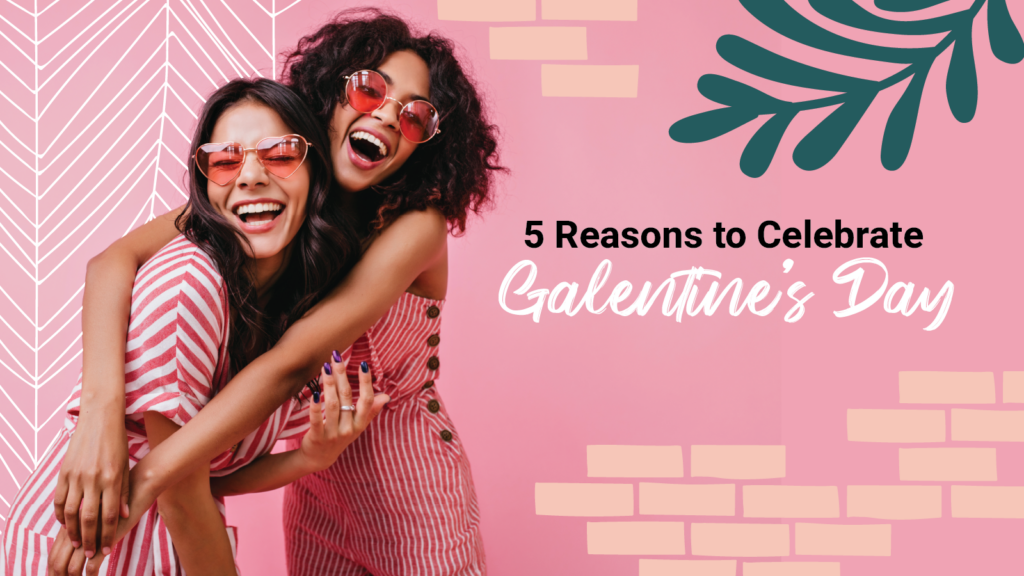 Two young women laugh while embracing eachother "5 Reasons to Celebrate Galentine's Day"