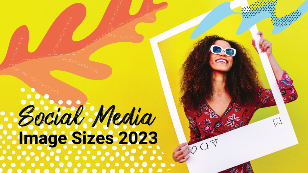 A woman poses for a picture with a giant polaroid prop "Social Media Sizes 2023"