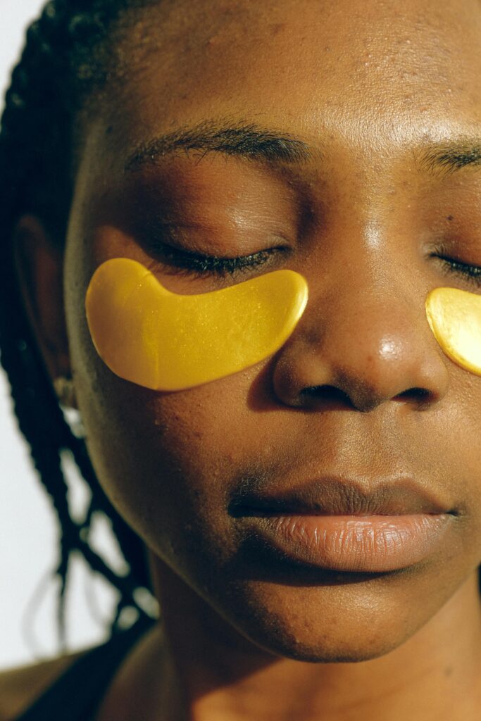 8THIRTYFOUR Blog: Self Care Blog Graphic a women with an eye mask on her face